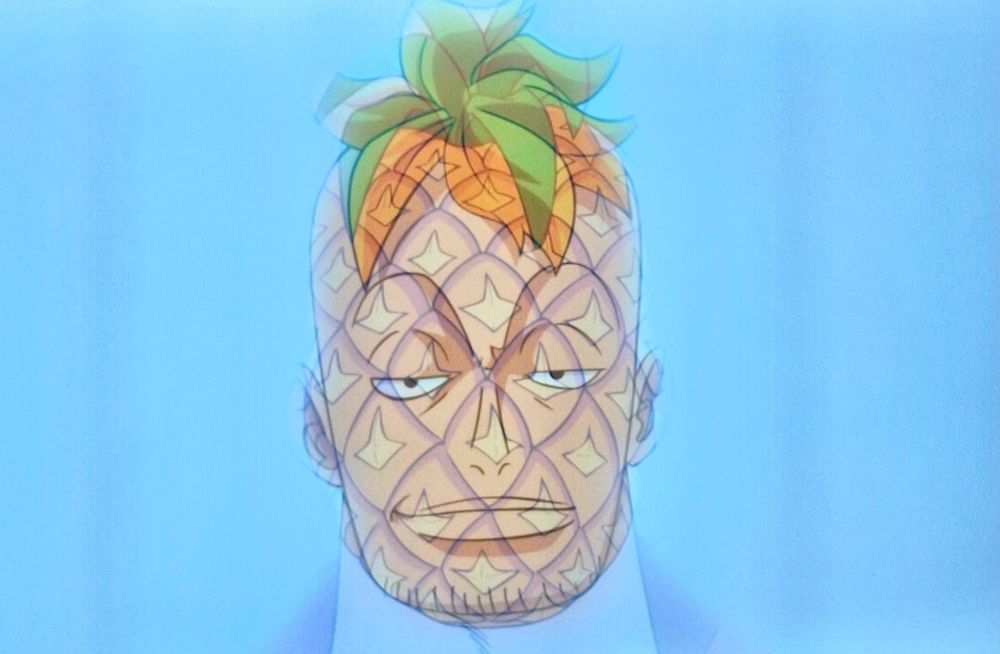 Marco the Phoenix's face overlayed on a pineapple.