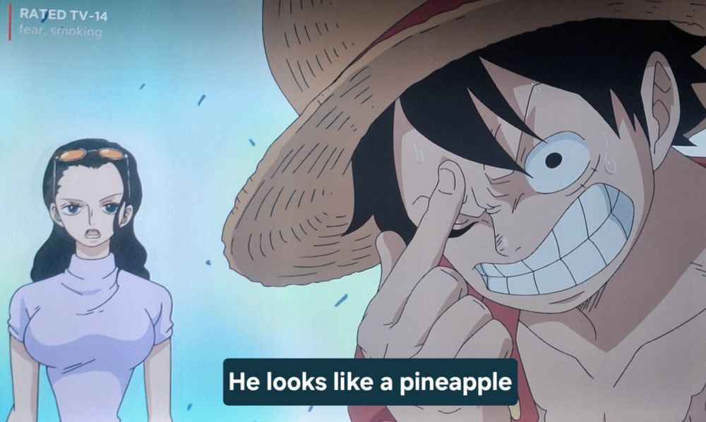 Nico Robin passing a mentally struggling Luffy in the background.

Robin flatly says "He looks like a pineapple"