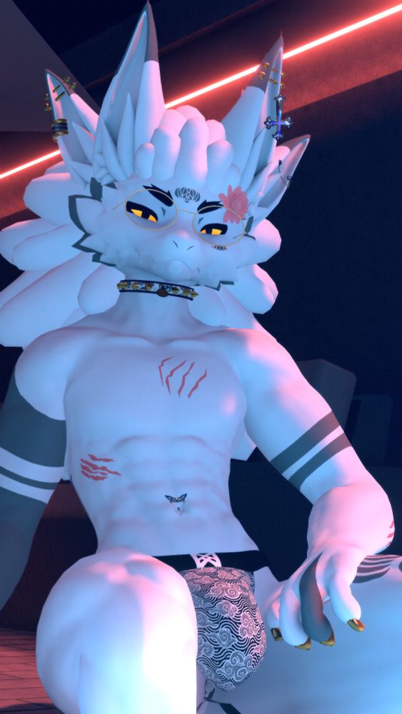 Aruni sits at the poolside, illuminated by the water and the reddish neon lights on the side. they wear nothing but a jockstrap, looking at the camera with an inquisitive stare.