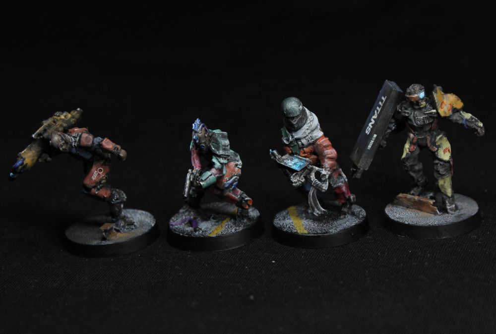 A group photo with two exosuit workers from the previous post.