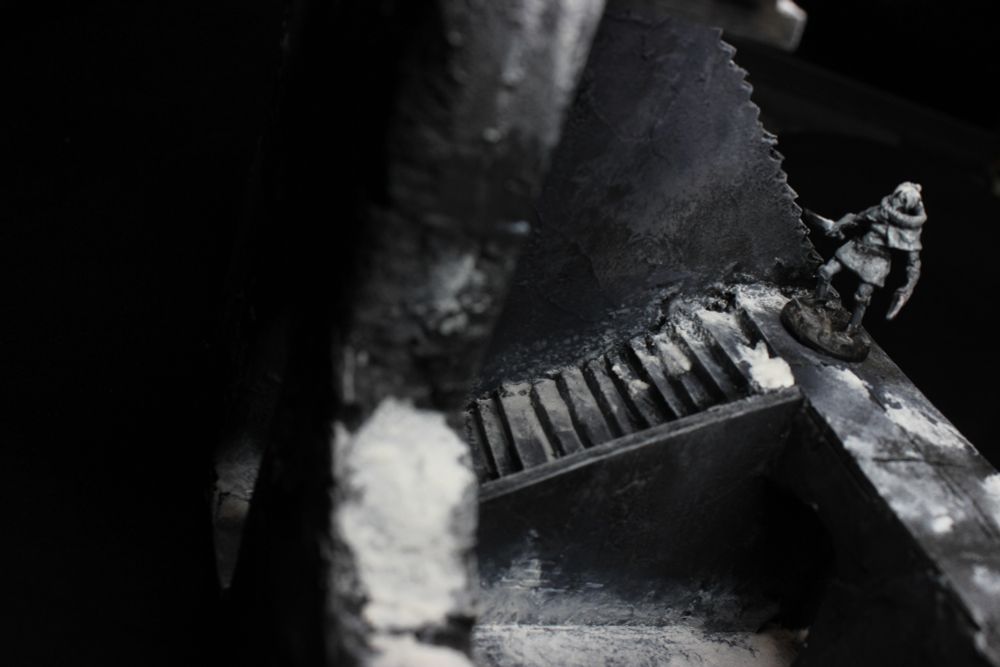 View from above, showing the first staircase. With a figure standing on top.