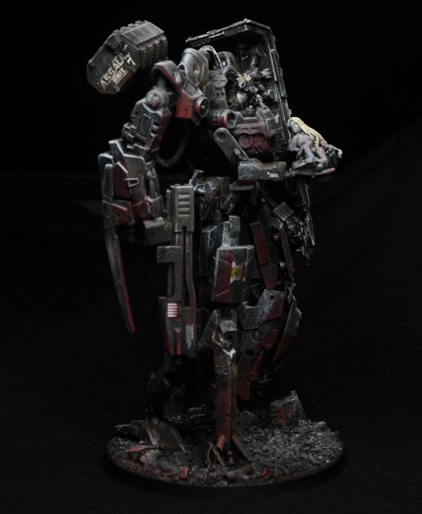 View from the right side. A bunch of weapons, and a bit of red glow from below/behind.