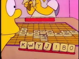 Bart Simpson playing Scrabble with his tiles spelling out K-W-Y-J-I-B-O