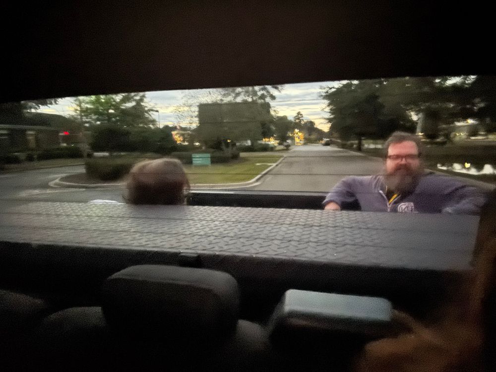 Two yahoos in the back of a truck 