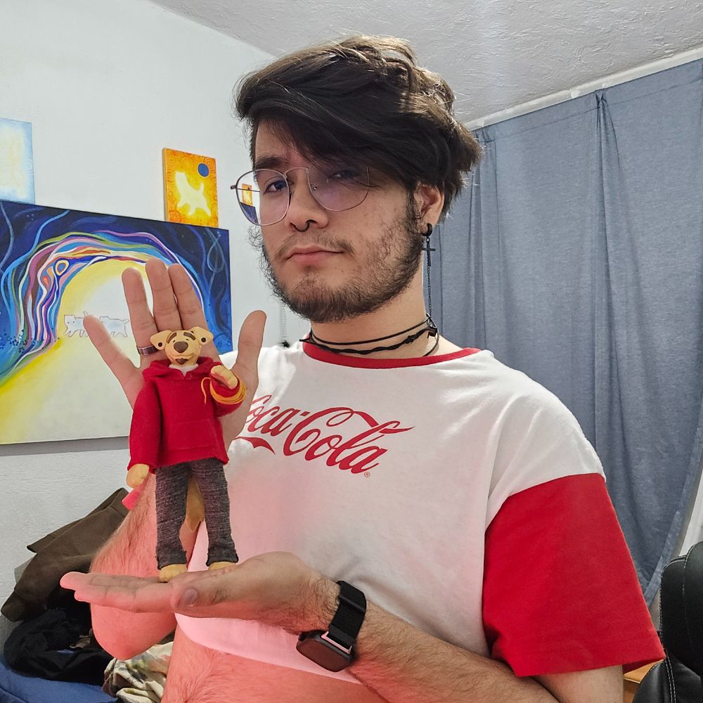 me holding a little dog figure of

me