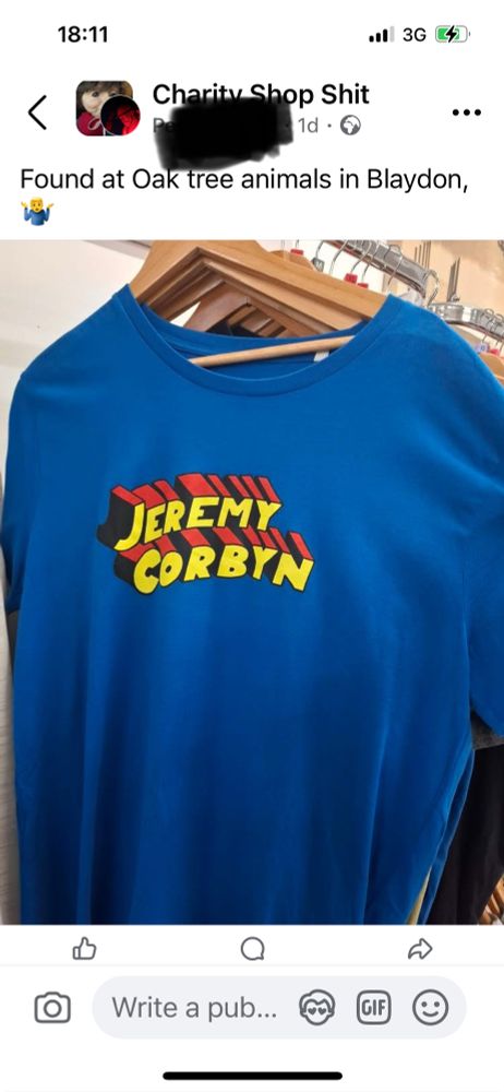 Blue Superman style “Jeremy Corbyn” sweatshirt in a charity shop, shared on a page called Charity Shop Shit 