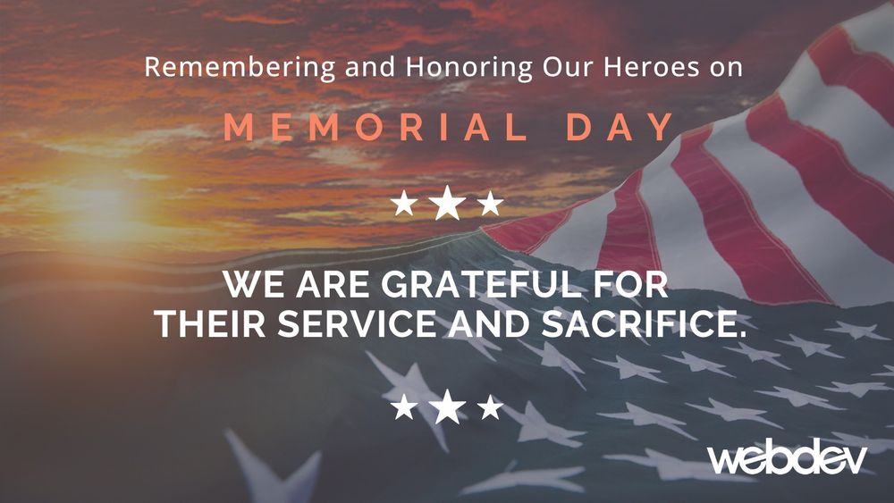 Sunrise with a waving flag and a Memorial Day message in white text overlay honoring heroes from WebDevStudios