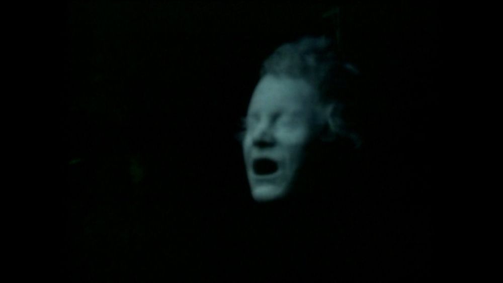 A ghostly face in the dark from the 1976 bbc adaptation of THE SIGNALMAN