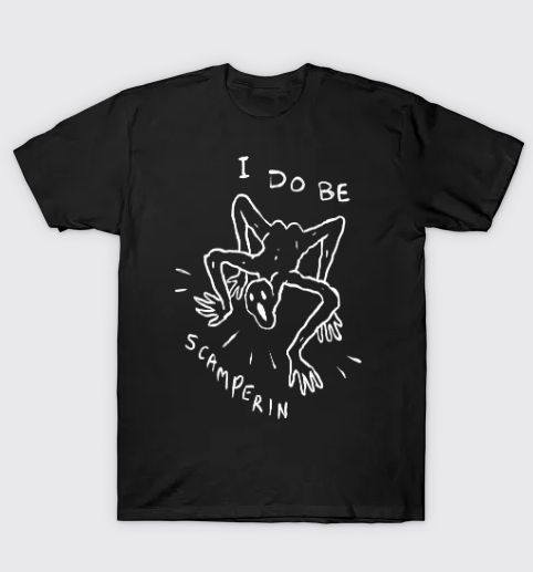 a white line drawing on a black shirt of a little weird ghoul guy scampering around naked on all fours. it says I Do Be Scamperin. we are all scampering under capitalism
