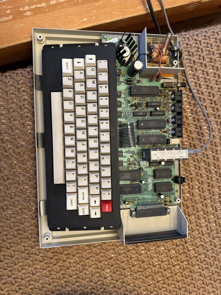 Top view with the cover off, you can see the circuit board and keyboard