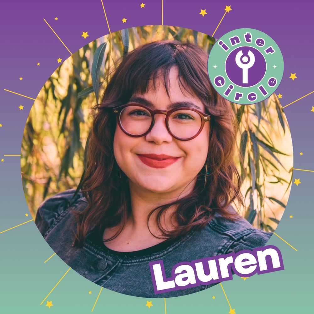 Lauren smiles at the camera with an "interCircle" logo above her and stars shooting out of a purple-and-green background. Lauren has medium-light skin and dark, shoulder-length hair. Lauren has red glasses, lipstick and wears a denim top.