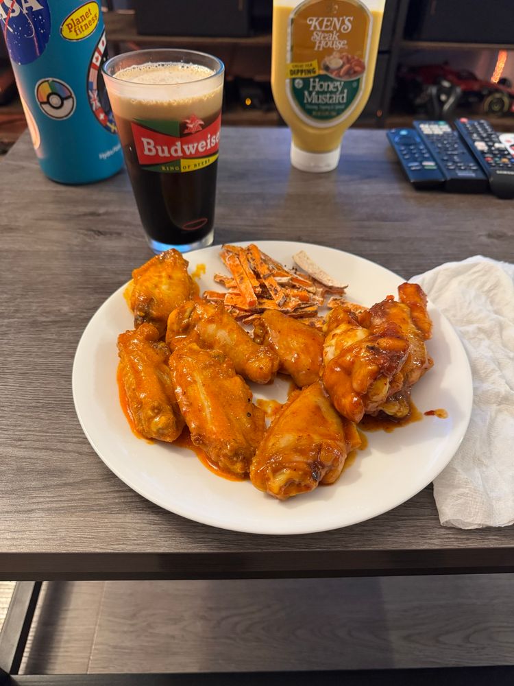 Final product with sweet potato fries and a beer