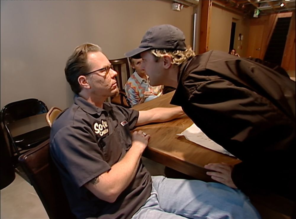 A still frame from the 2004 documentary Metallica: Some Kind of Monster of Lars Ulrich getting in the face of James Hetfield during an argument.