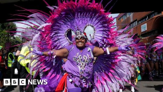 Notting Hill Carnival in pictures: Revellers dazzle in colourful costumes