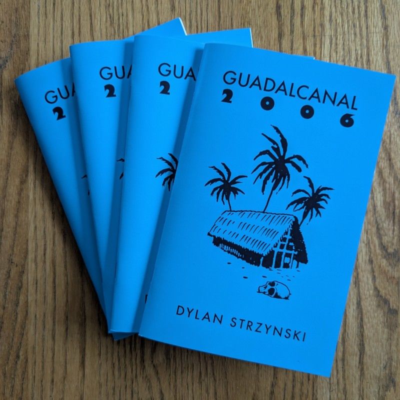 The cover of Guadalcanal 2006, which is bright blue with black print and a line drawing up a hut next to palm trees and a skull.