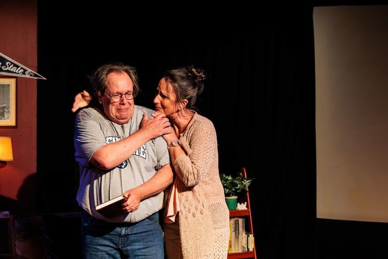 A wife comforts her husband when he’s sad.
