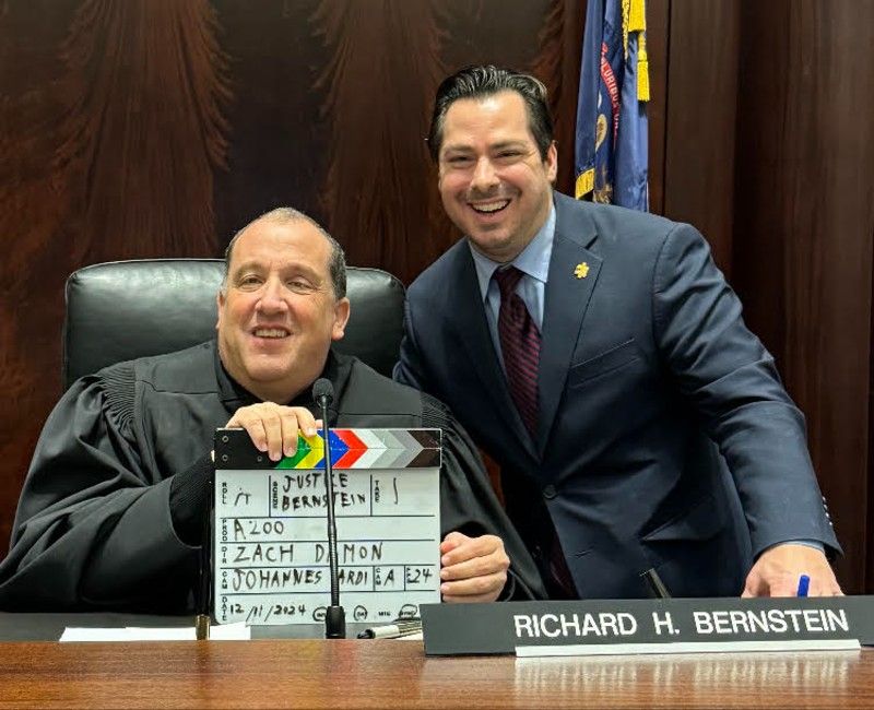 Michigan Supreme Court Justice Richard Bernstein with Zach Damon.