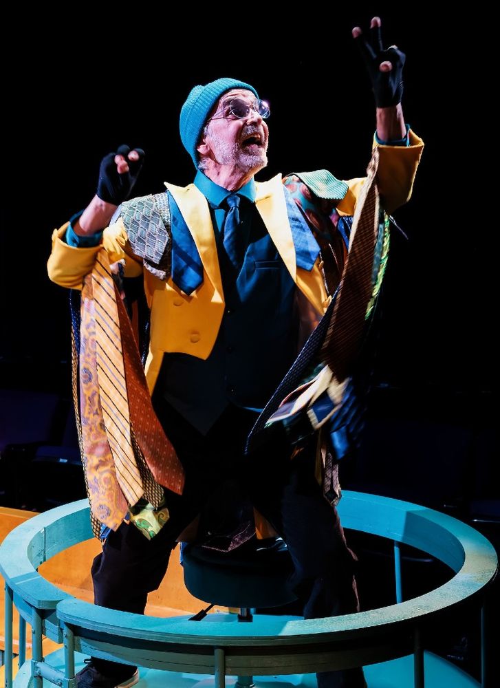 Leonard the parrot, played by John Seibert. Photography by Sean Carter Photography.
