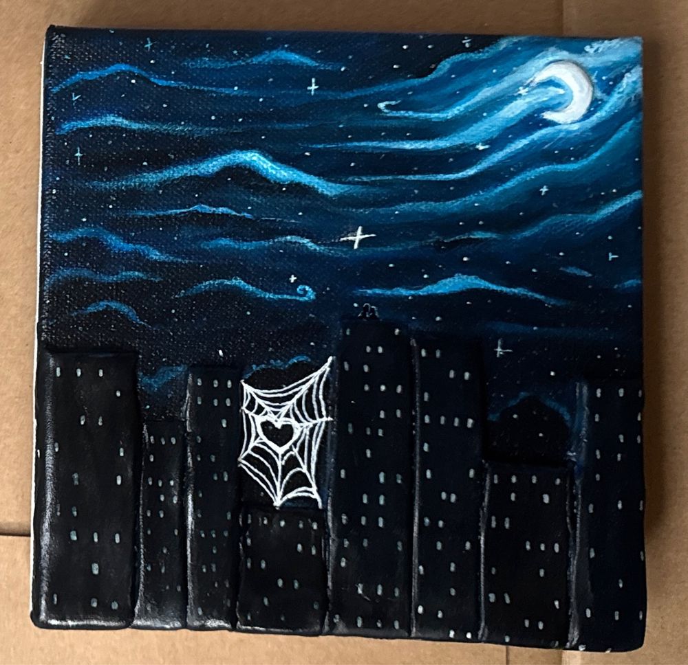 Monochrome blue cityscape with heart Spider-Man webs