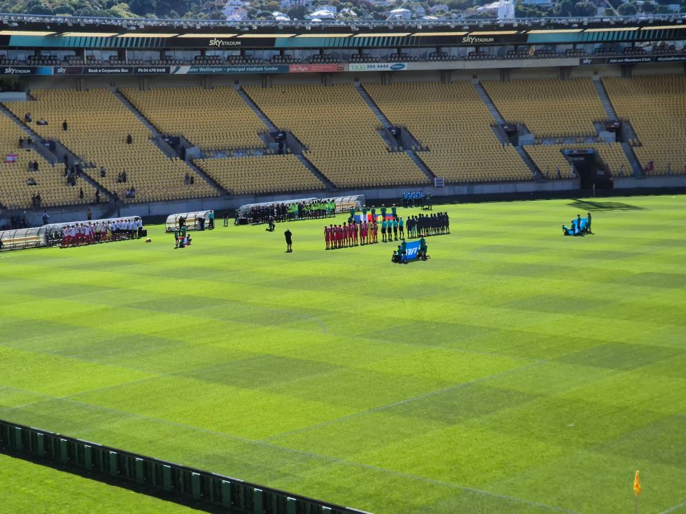 Tahiti and New Caledonia teams line up before kickoff.
