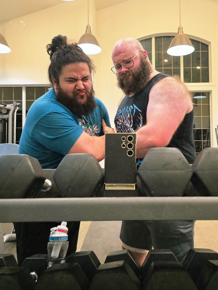 Two bulls at the gym being goofs