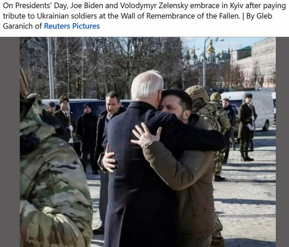On Presidents' Day, Joe Biden and Volodymyr Zelensky embrace in Kyiv after paying tribute to Ukrainian soldiers at the Wall of Remembrance of the Fallen. | By Gleb Garanich of Reuters Pictures