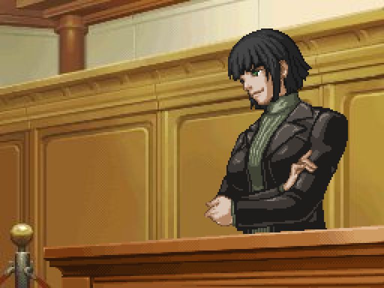 A sprite of a woman standing at a prosecutor's bench. She has dark hair, a leather jacket, and a green turtleneck. her arms are folded and she's smirking.