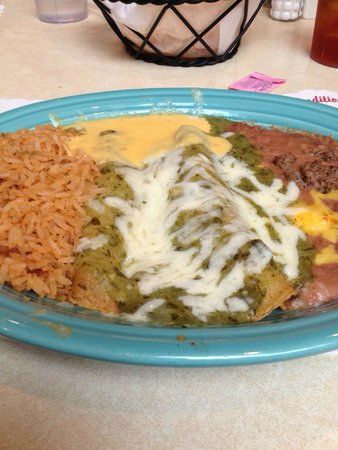tex mex enchilada, refried beans, rice, and queso