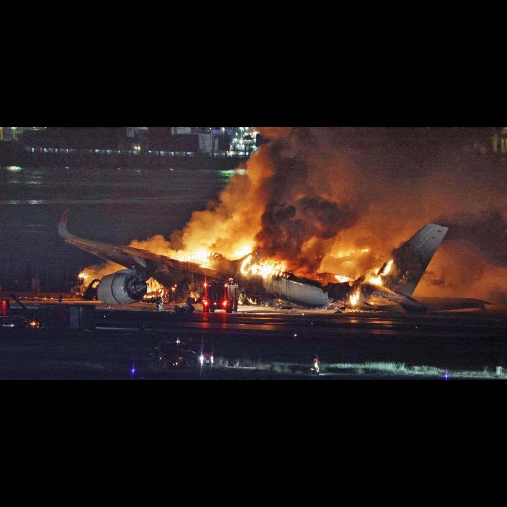 Plane engulfed in flames at Japan airport after collision kills 5