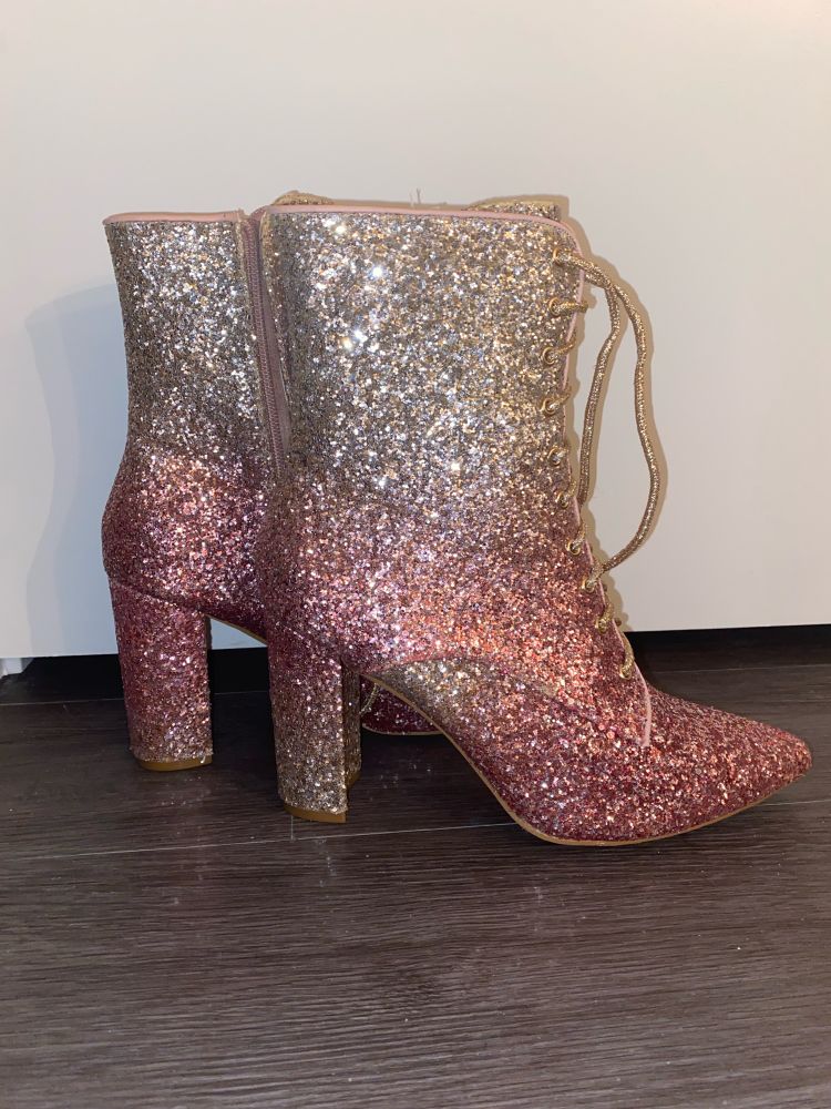 Glittery pink gradient heeled boots purchased at a steep discount