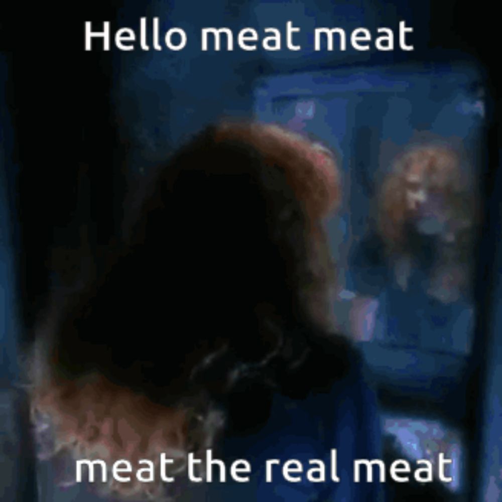 a blurred image of a person with the words hello meat meat meat the real meat