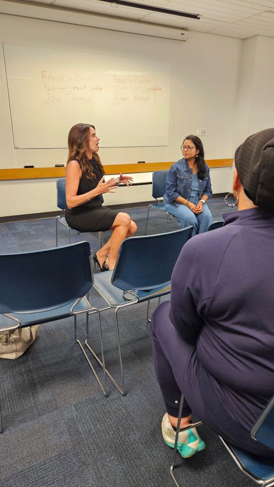 Closeup of discussion with Judge Jodi Thomas and candidate Ajmeri Hoque