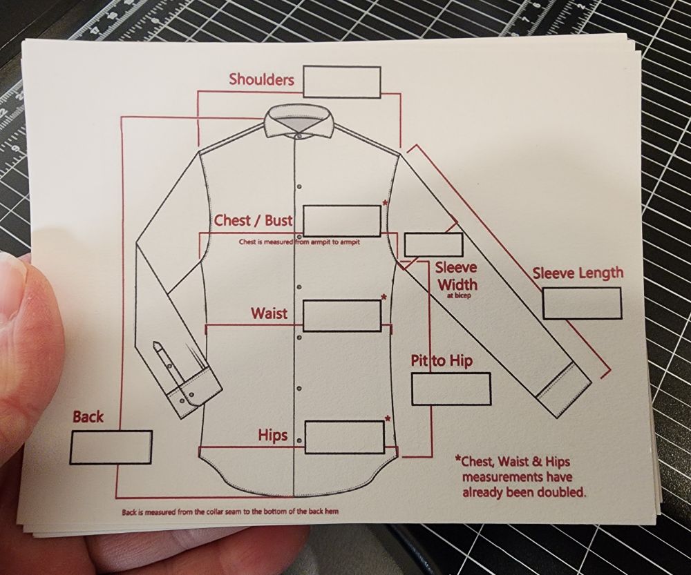 A line drawing of a shirt with boxes for all the measurements