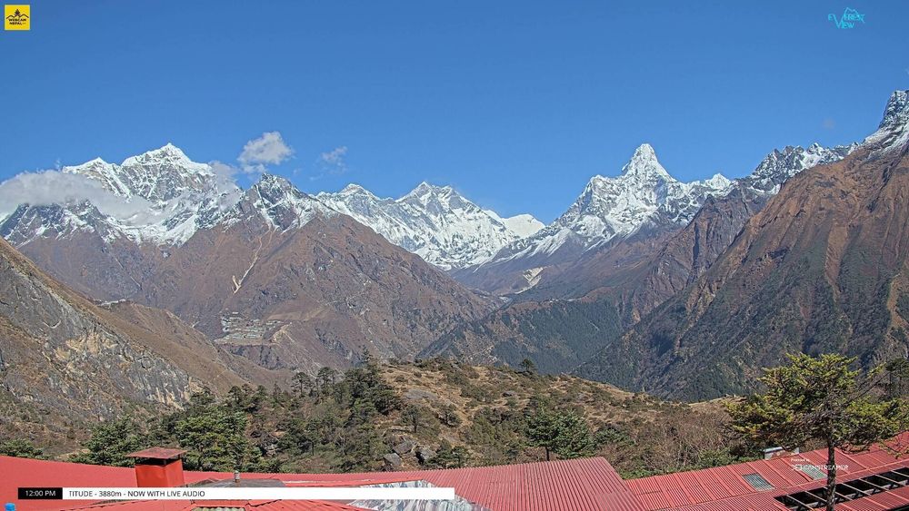 A wide view of several mountains, from left:

- Taboche (6,500 meters/21,325 feet)
- Mount Everest (8,848 meters/29,032 feet)
- Lhotse (8,516 meters/27,939 feet)
- Ama Dablam (6,814 meters/22,355 feet)