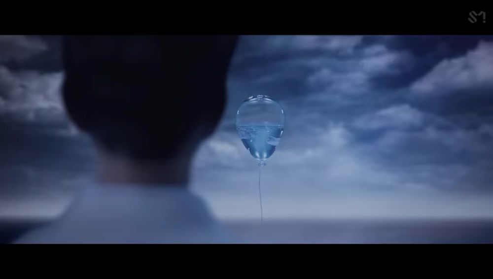 screen shot from onew’s ‘blue’ music video