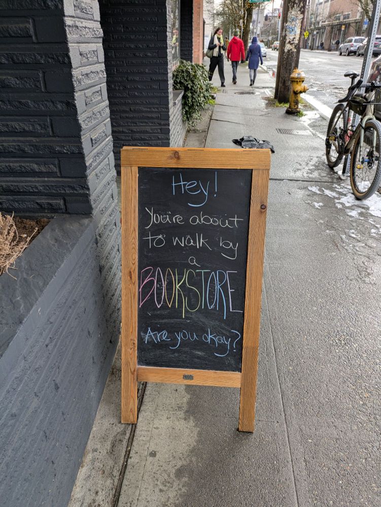 Bookstore sign: Hey! You're about to walk by a bookstore. Are you okay?