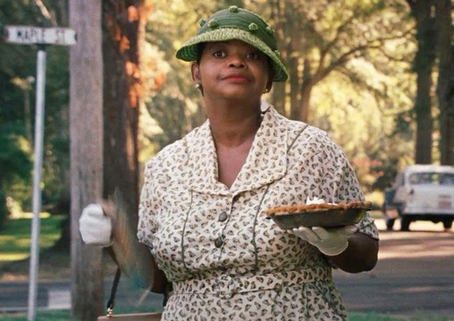 Minnie from The Help holding her famous pie with a little extra sumthin in the recipe