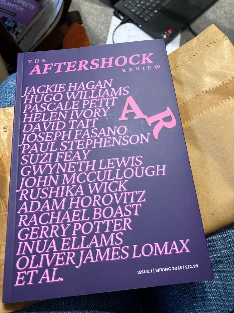 The cover of Aftershock Review, issue 1. It consists of a list of poets whose poems are in the magazine.
