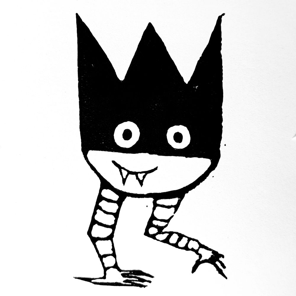 Linocut print in black on white paper. Print is a wee round-ish creature with a crown making up most of its head. It has fangs, is smiling, and has bird-like feet. 