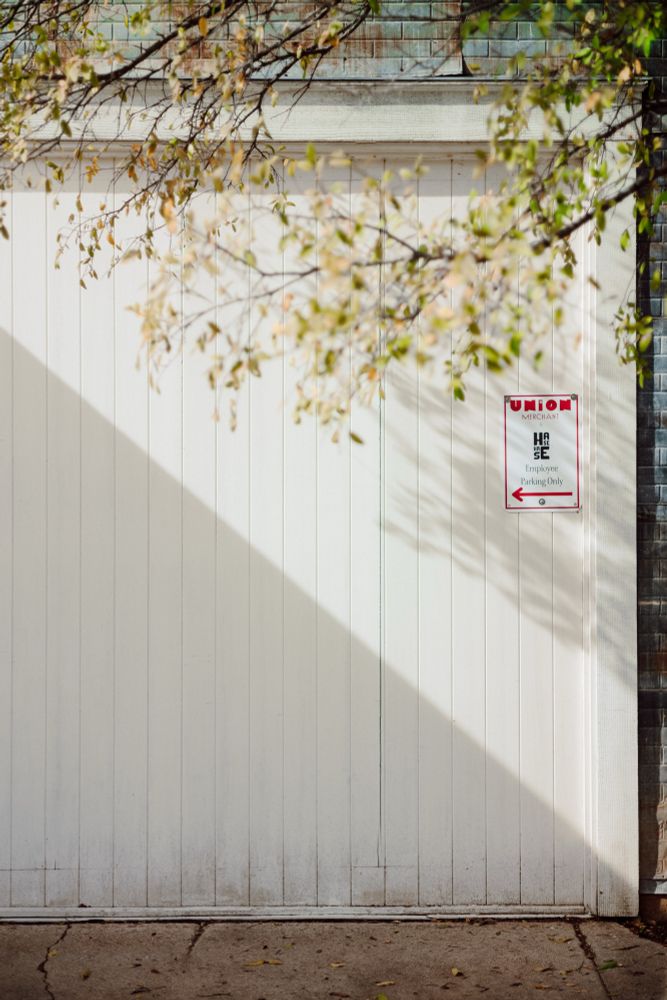 A very geometric shadow on a white wall 