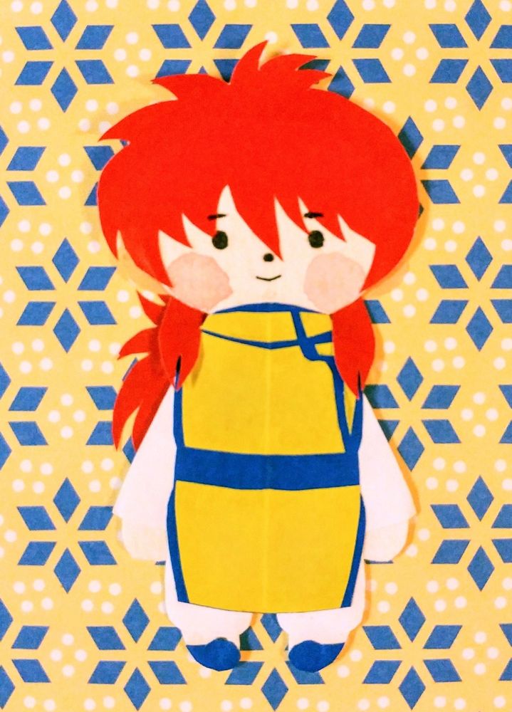 papercraft kurama from yu yu hakusho. his outfit is yellow and blue. 
