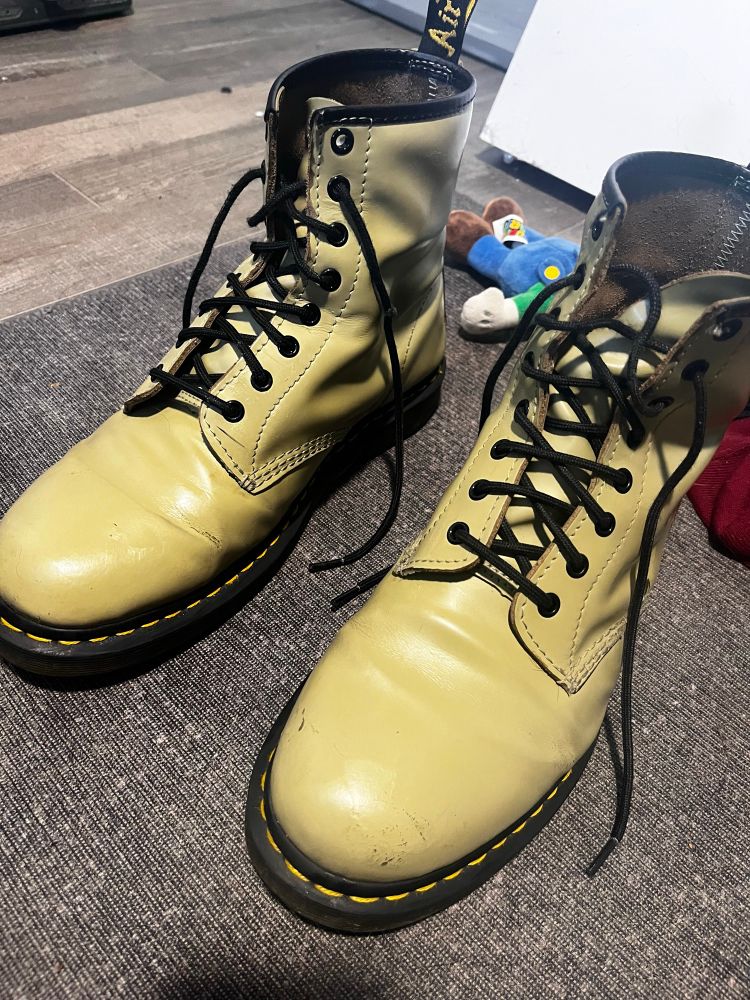 Olive green doc martens, a little worn but clean 