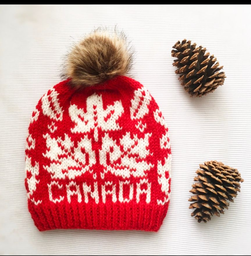 Knit toque with Canada and maple leaf 
