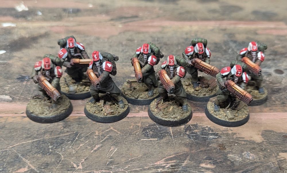 Imperial Guard plasma gunners with freshly painted heat/glow effect.