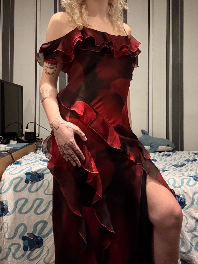 A picture of me in a red and black dress