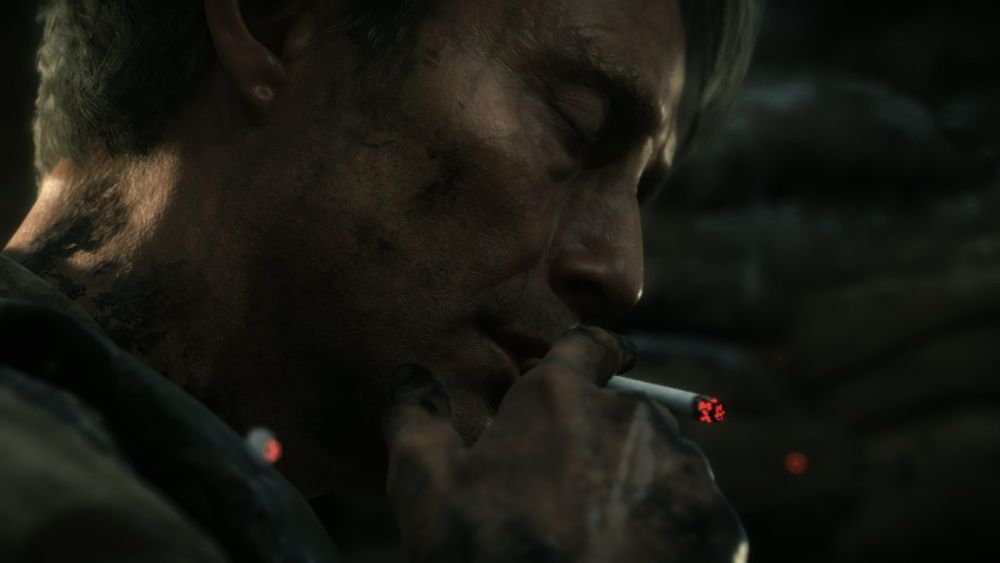 Screenshot from the video game Death Stranding (2019), featuring antagonist Clifford Unger (played by Mads Mikkelsen) sexily smoking a cigarette