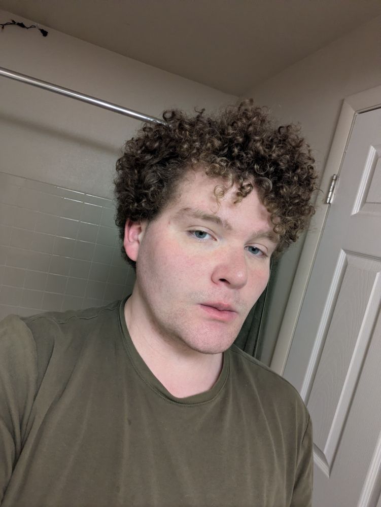 Steven, tired and with messy hair 