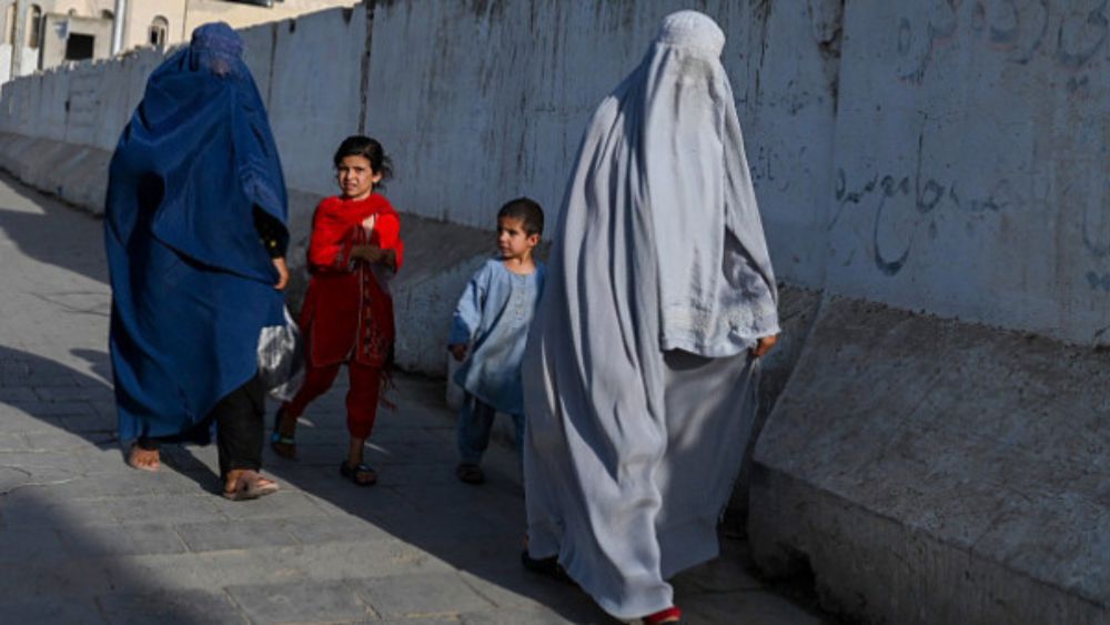 Did the Taliban ban women from speaking in public?