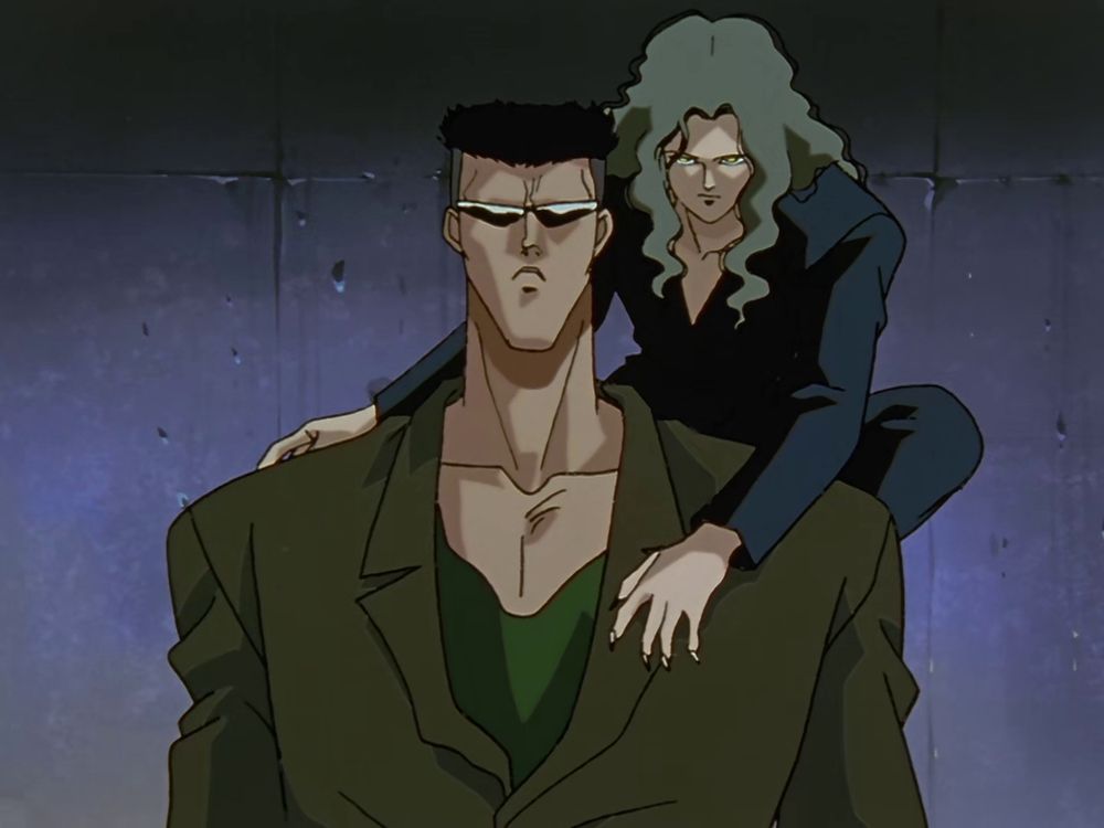 Screenshot from yuyu hakusho of the toguro brothers, the elder perched on the younger’s shoulder, as they do