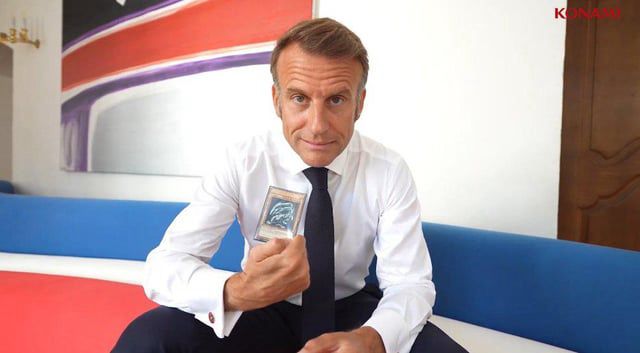 President Marcon HON HON HON holding a bleu eyes white dragon 